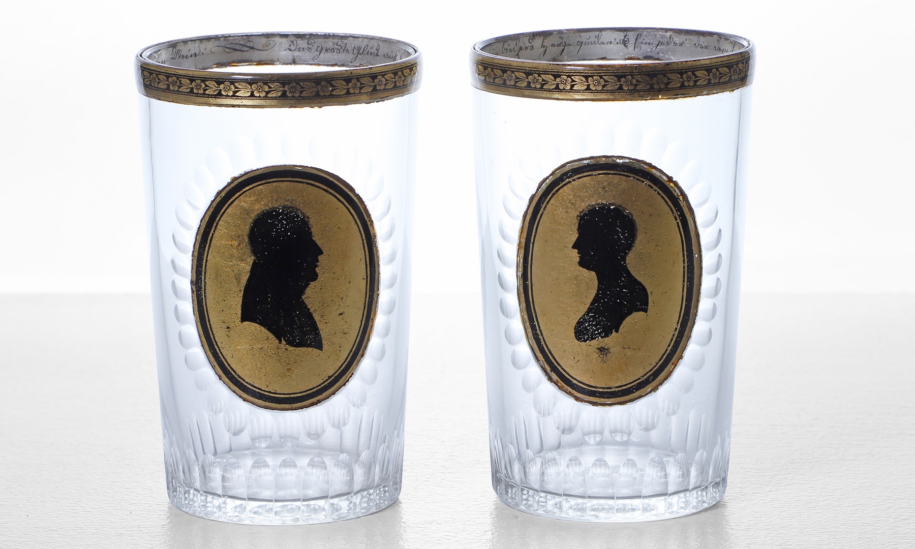A pair of Zwischengoldglas glass beakers, late 18th century (Sold for £3,640)